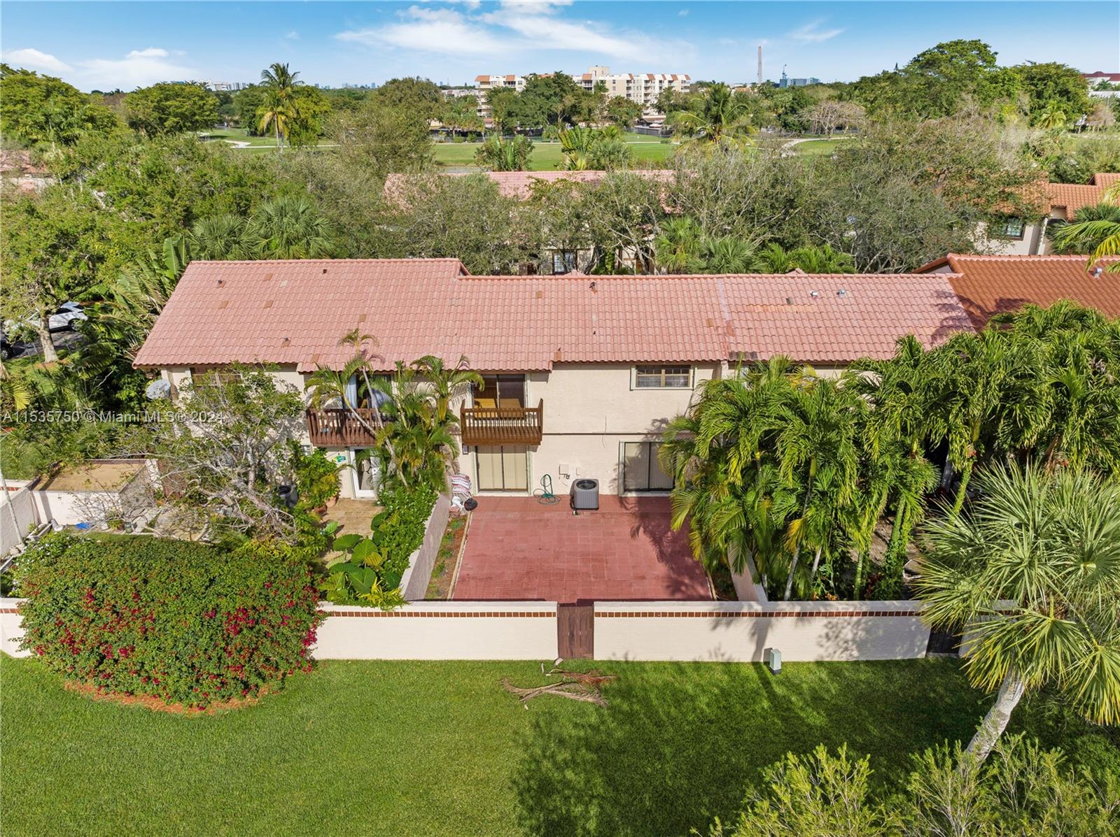 13225 Southwest 95th Avenue, Unit 13225 Miami, FL 33176 - Photo 32 of 36 an aerial view of house with yard