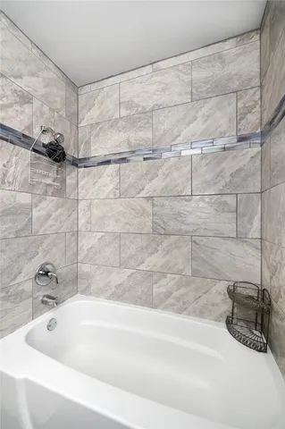 a bathroom with a bathtub