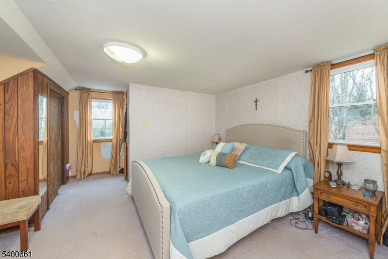 131 Taylortown Road Montville, NJ 07005 - Photo 17 of 26 a bedroom with a bed and a window