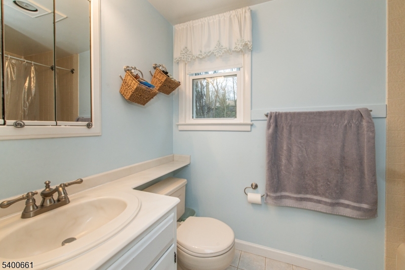 131 Taylortown Road Montville, NJ 07005 - Photo 19 of 26 a bathroom with a sink toilet and shower