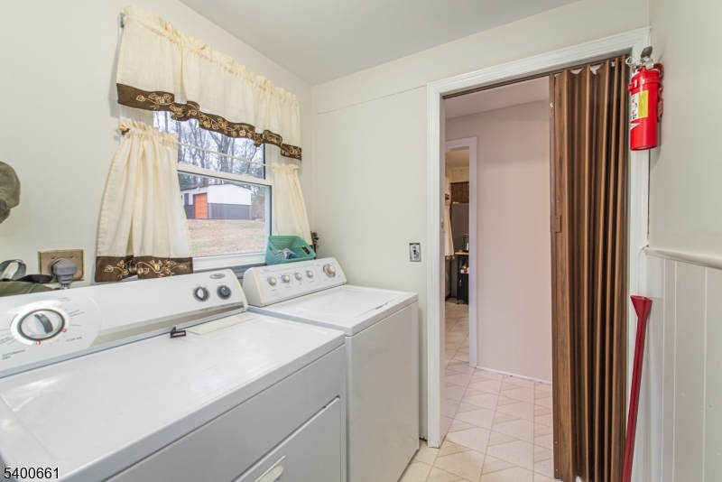 131 Taylortown Road Montville, NJ 07005 - Photo 23 of 26 a bathroom with a sink and a mirror