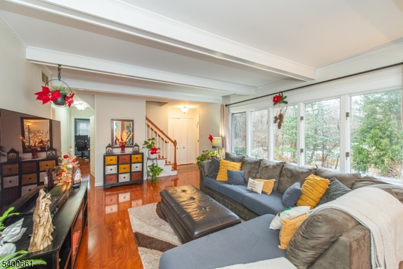 131 Taylortown Road Montville, NJ 07005 - Photo 4 of 26 a living room with furniture and a large window