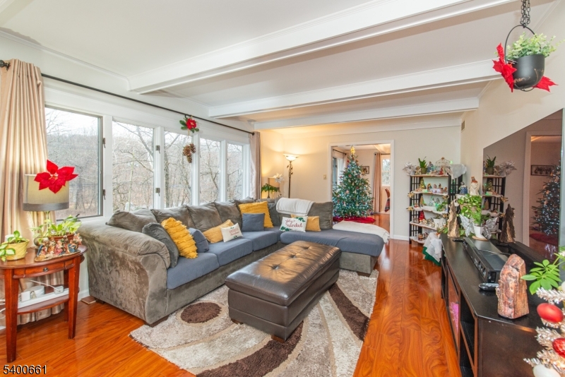 131 Taylortown Road Montville, NJ 07005 - Photo 5 of 26 a living room with furniture and a large window