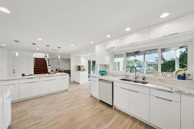 a living room with furniture a rug and a window