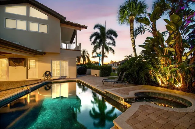 a view of a swimming pool with a patio