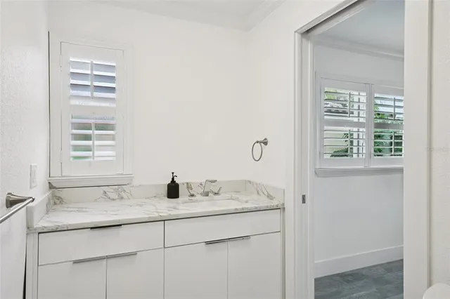 wooden floor in an empty room and a window