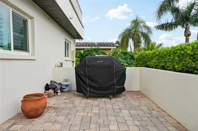a view of a lake with a lawn chairs
