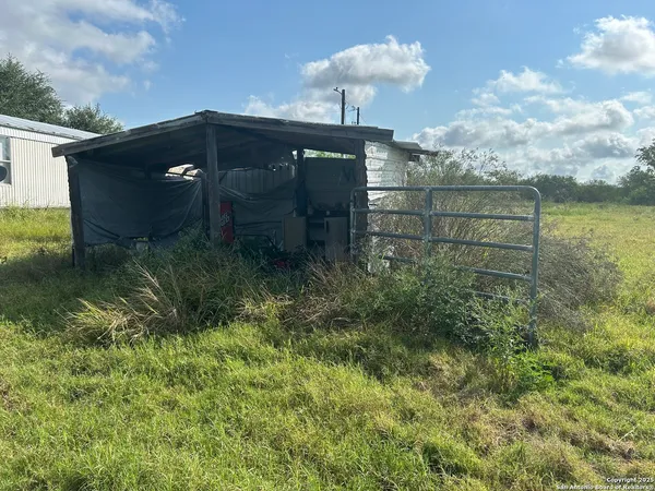 a view of a yard in front of a house