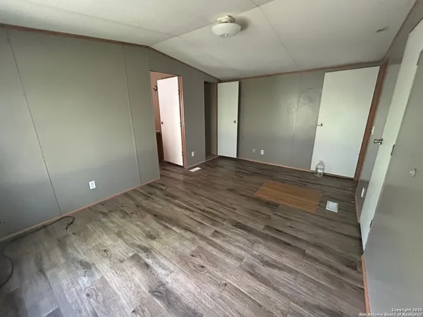 a view of a livingroom with wooden floor