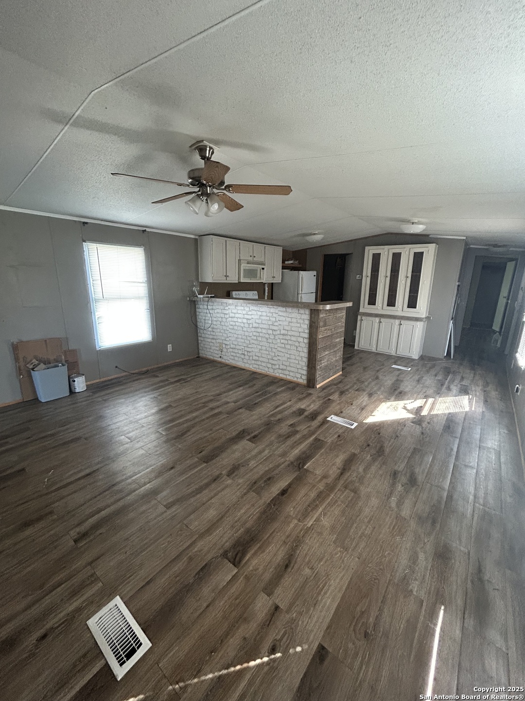 1242 Cologne Road Victoria, TX 77905 - Photo 9 of 29 a view of livingroom and hardwood floor