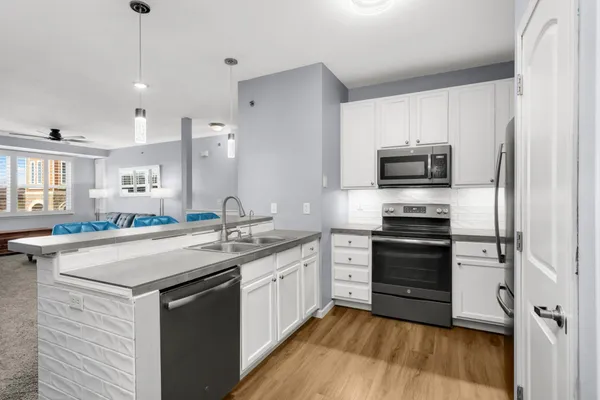 $200,000 | 10075 City Walk Drive, Unit 205, Woodbury, MN 55129