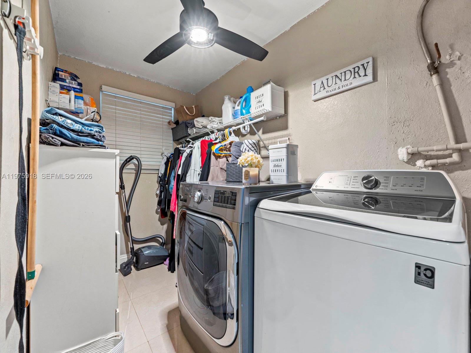 30236 Southwest 148th Place Homestead, FL 33033 - Photo 18 of 69 a utility room with dryer and washer