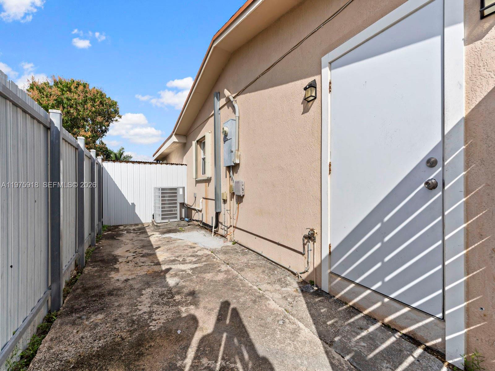 30236 Southwest 148th Place Homestead, FL 33033 - Photo 50 of 69 a view of a house with a stairs and wooden floor
