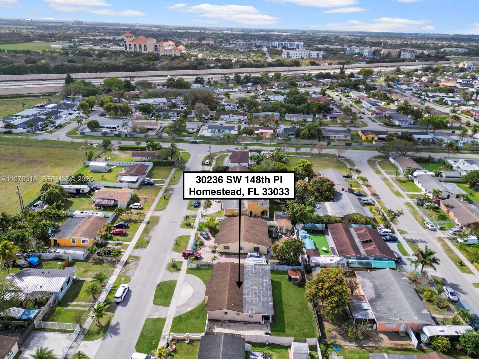 30236 Southwest 148th Place Homestead, FL 33033 - Photo 59 of 69 an aerial view of residential houses with outdoor space