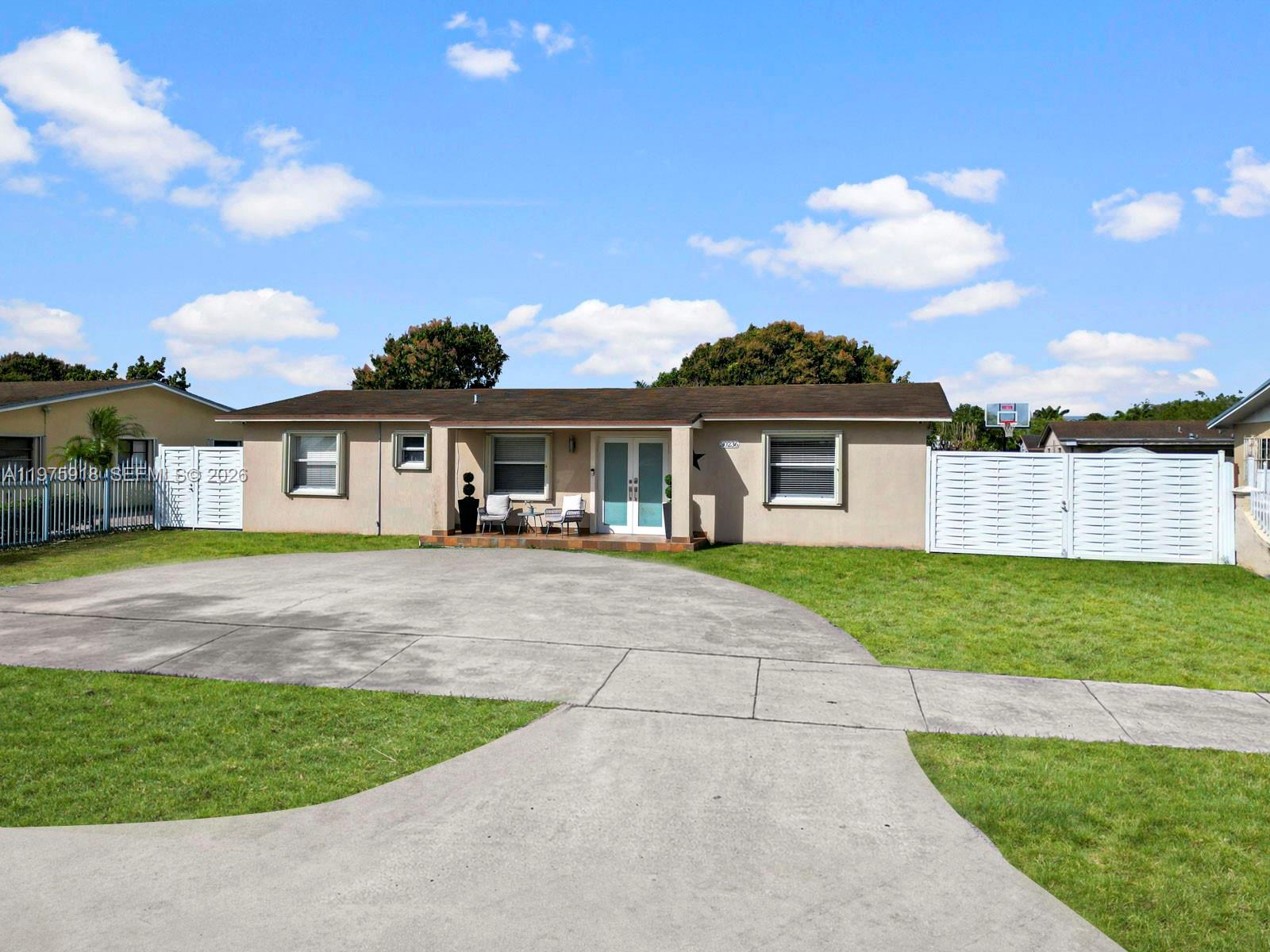 30236 Southwest 148th Place Homestead, FL 33033 - Photo 64 of 69 front view of a house with a yard