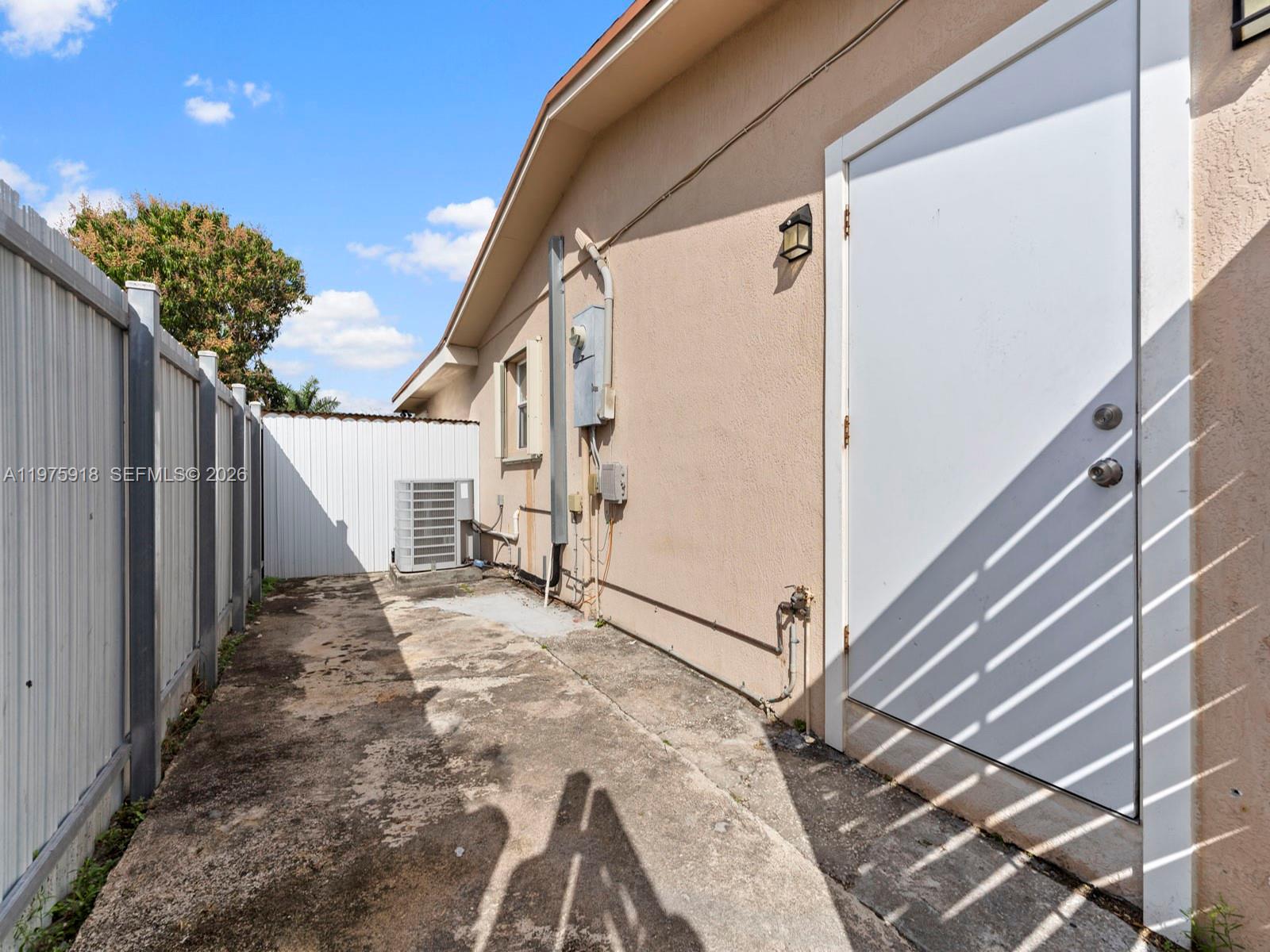 30236 Southwest 148th Place Homestead, FL 33033 - Photo 68 of 69 a view of a house with a staircase