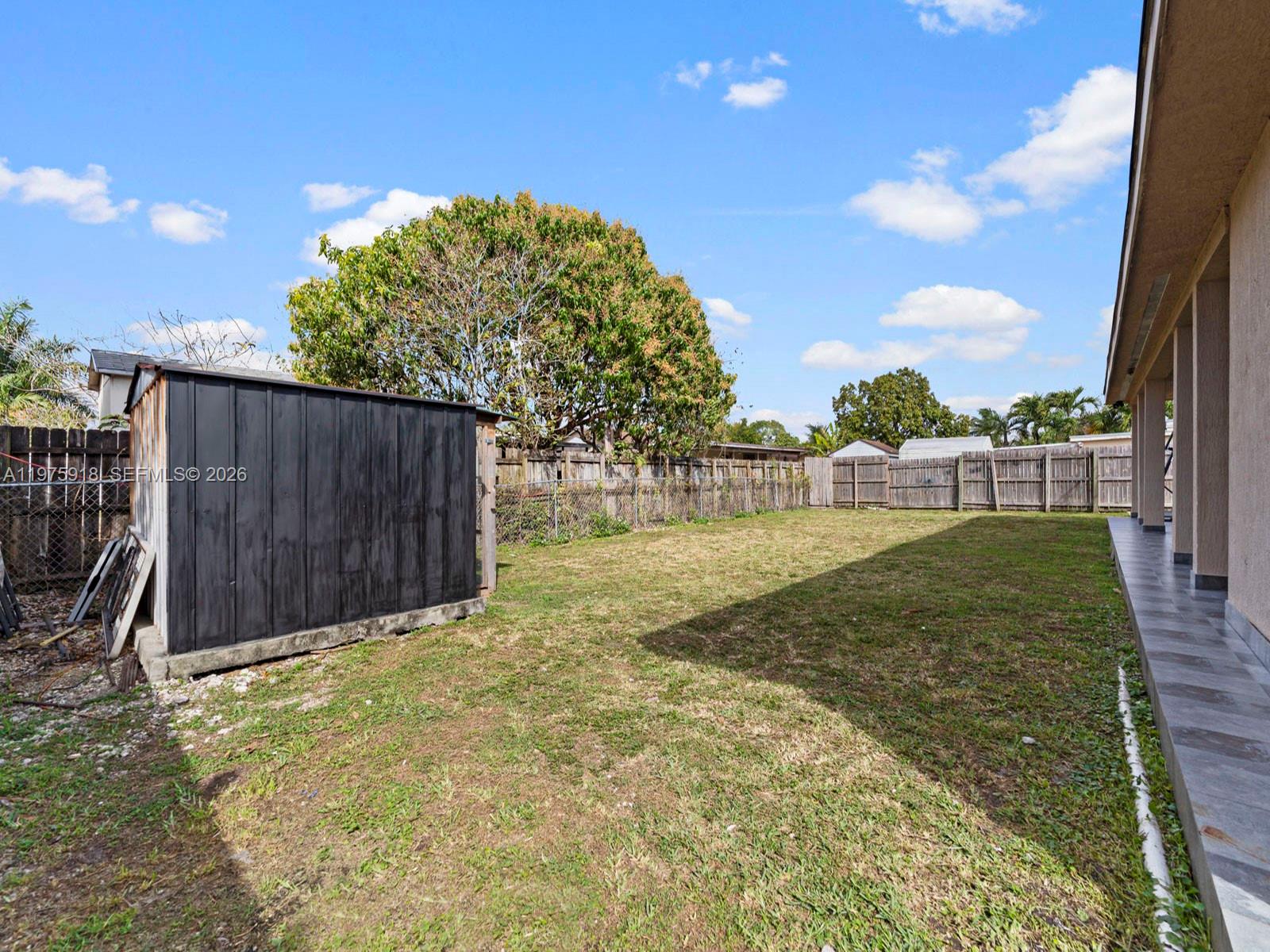 30236 Southwest 148th Place Homestead, FL 33033 - Photo 69 of 69 a view of backyard with barn and a cactus plant