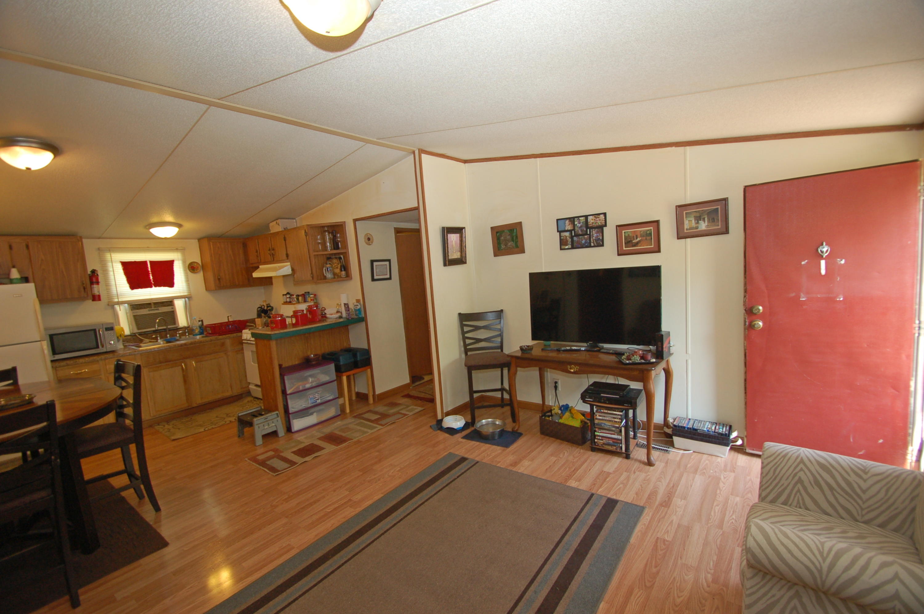 3189 Half Acre Of Rocks Road Elliston, VA 24087 - Photo 3 of 24 a living room with furniture and a flat screen tv