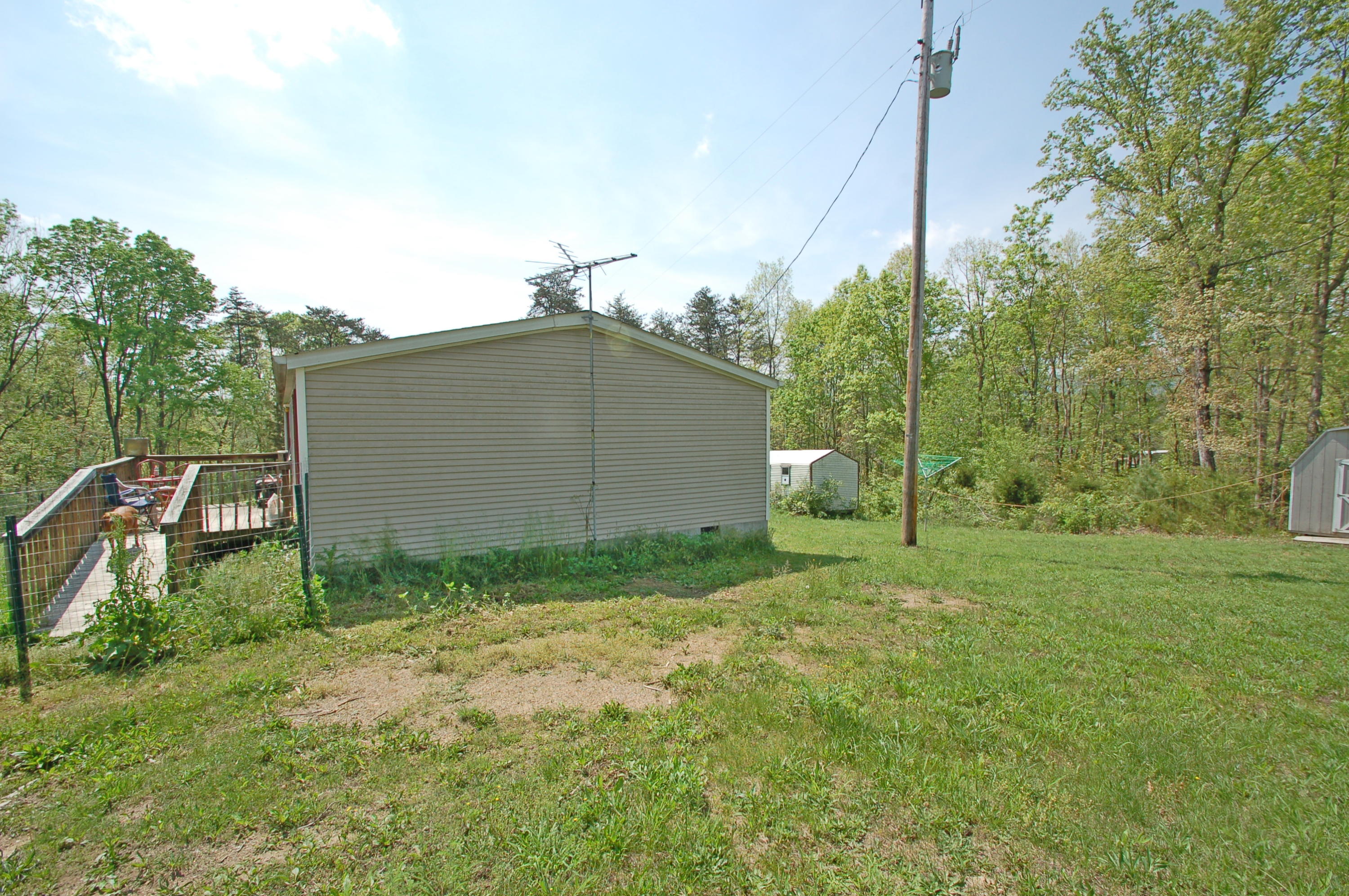3189 Half Acre Of Rocks Road Elliston, VA 24087 - Photo 22 of 24 a backyard of a house