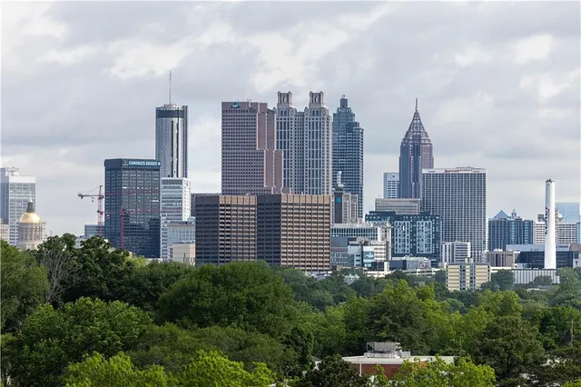 a view of a city with tall buildings in the background