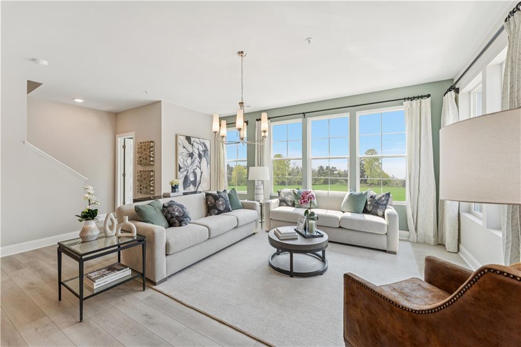316 Skylar Court Southeast, Unit 94 Atlanta, GA 30312 - Photo 9 of 30 a living room with furniture and a large window