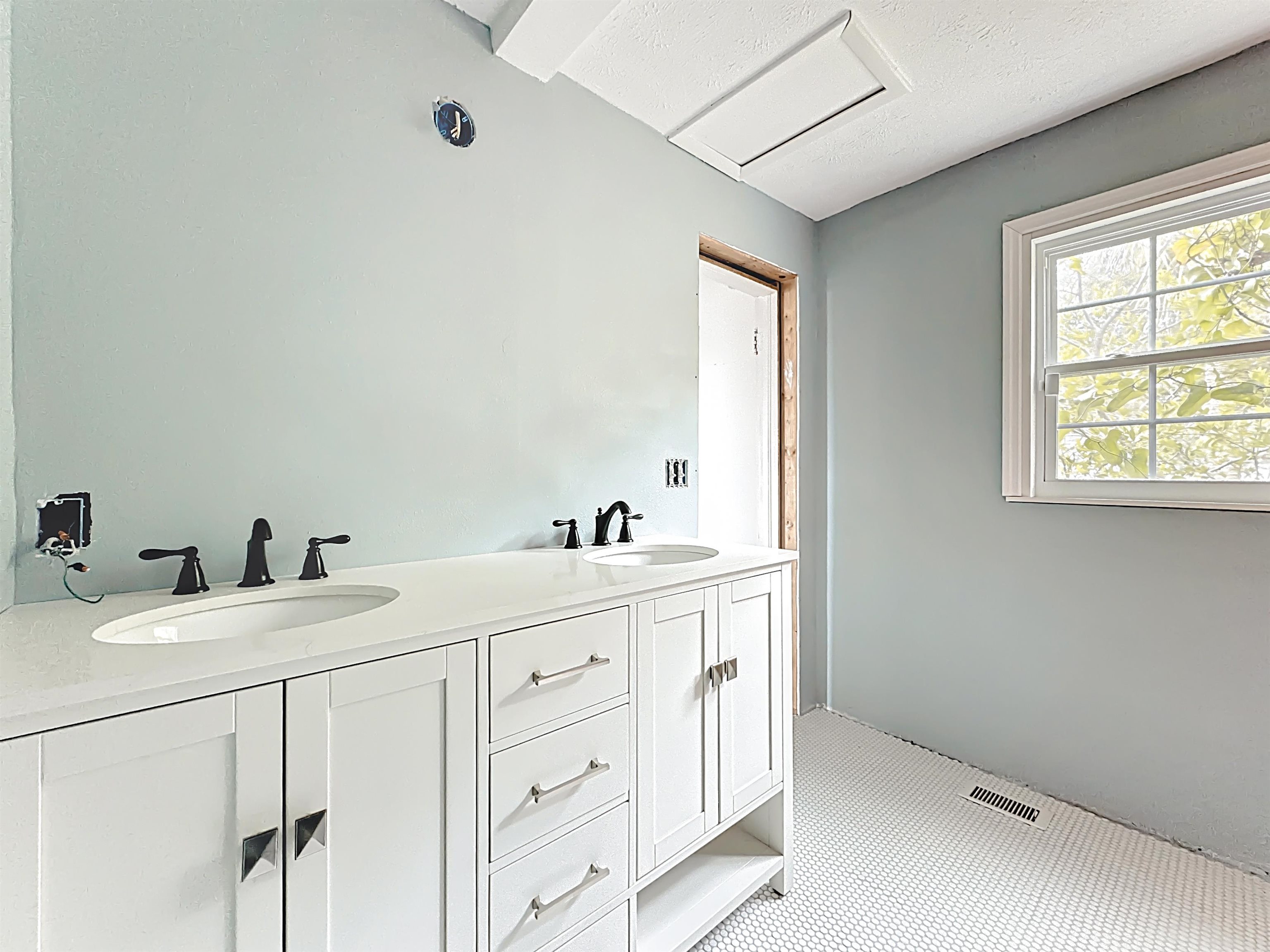 17 Salt Run Court St. Augustine, FL 32080 - Photo 15 of 33 a room with a sink and a mirror