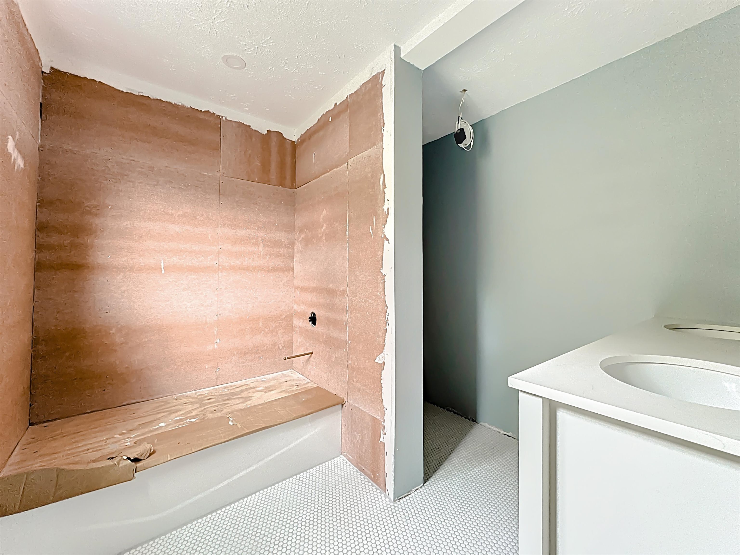 17 Salt Run Court St. Augustine, FL 32080 - Photo 16 of 33 a bathroom with a tub and a sink