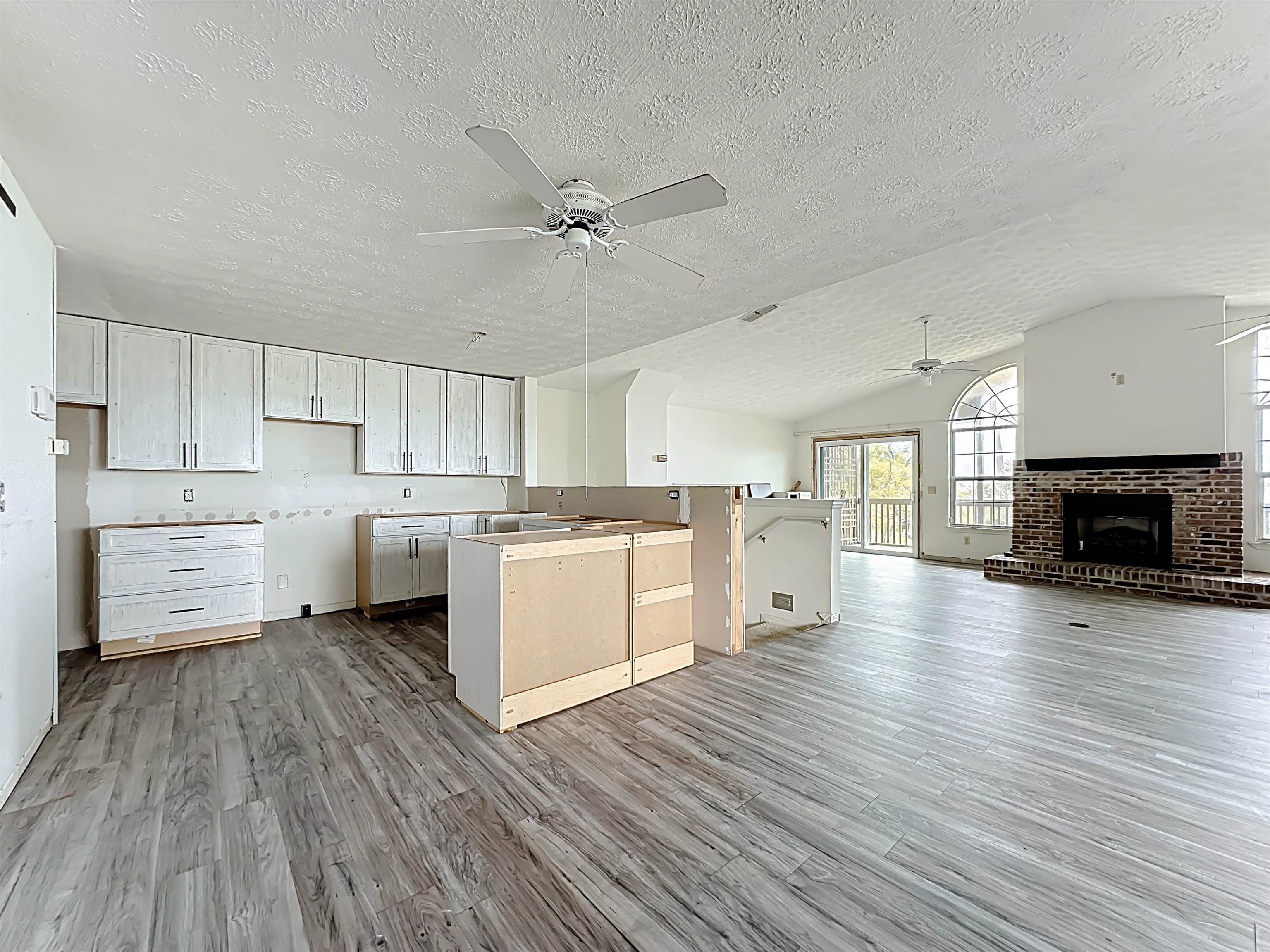 17 Salt Run Court St. Augustine, FL 32080 - Photo 20 of 33 a kitchen with white cabinets and white appliances