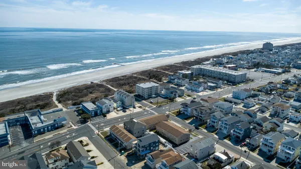 an aerial view of a ocean and beach