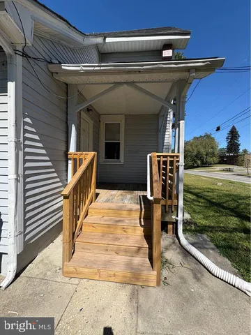 a view of street along with trees