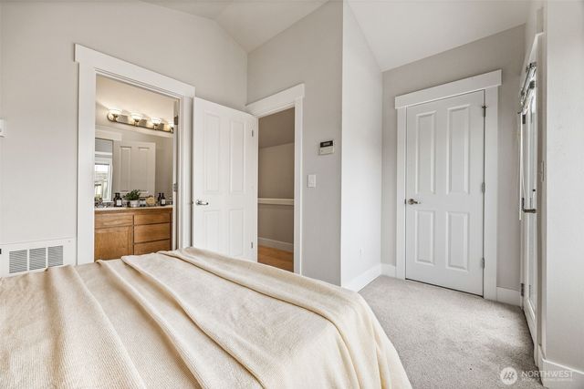 a bathroom with a sink mirror toilet and bathtub