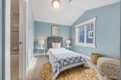 a bathroom with a sink mirror toilet and bathtub