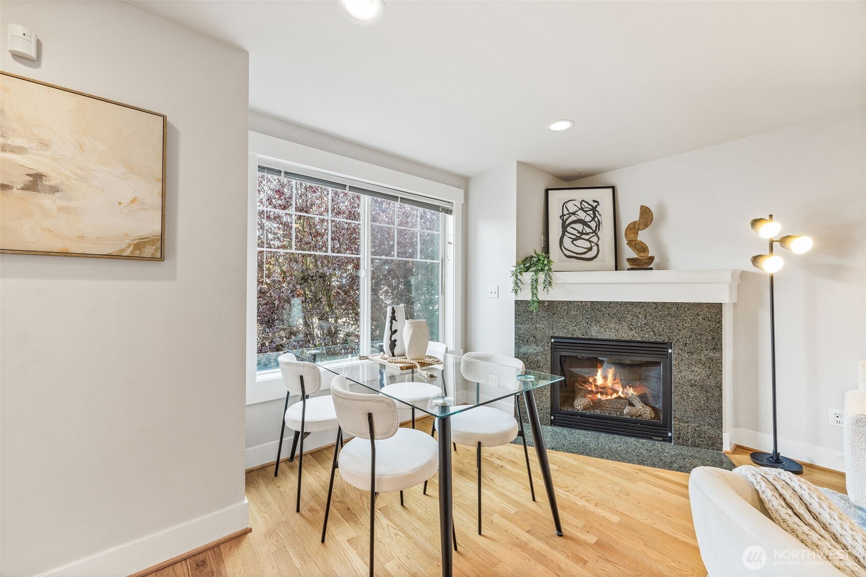 910 Northwest 85th Street, Unit B Seattle, WA 98117 - Photo 8 of 21 a living room with furniture and a fireplace