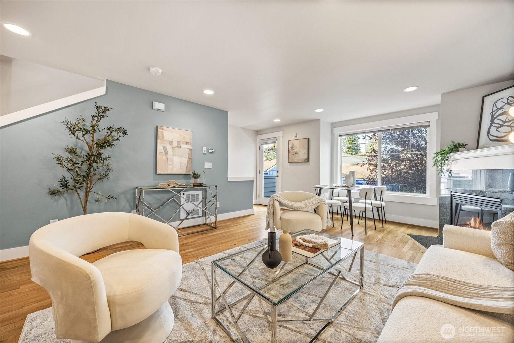 910 Northwest 85th Street, Unit B Seattle, WA 98117 - Photo 10 of 21 a living room with furniture and a large window