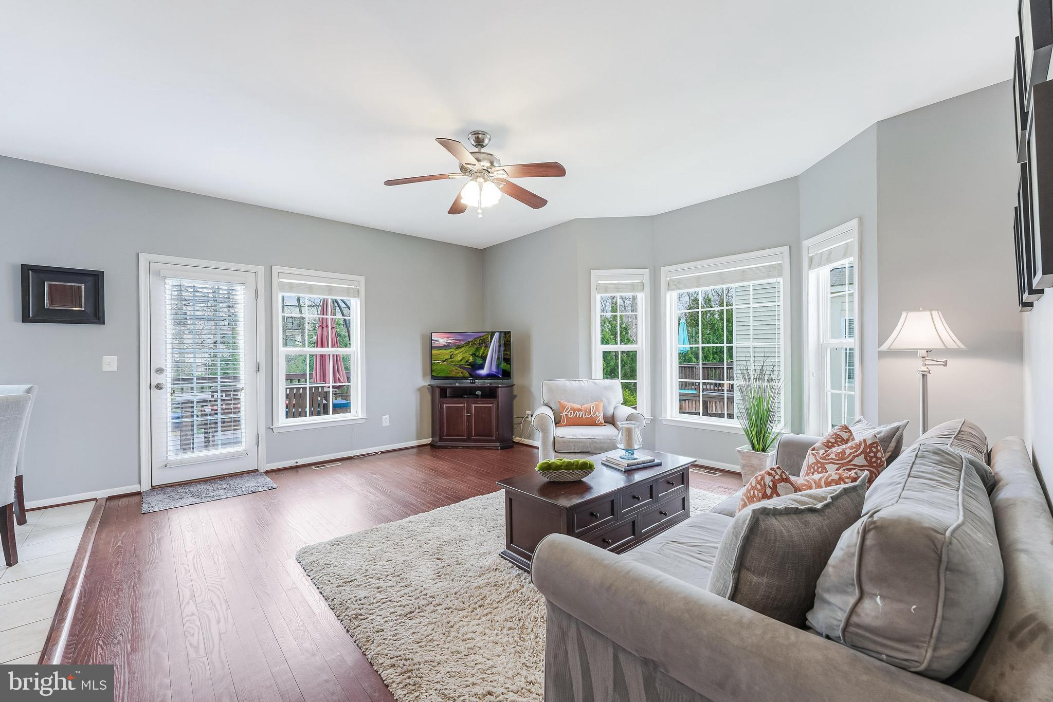 42467 Patrick Wayne Square Ashburn, VA 20148 - Photo 12 of 60 a living room with furniture and a large window