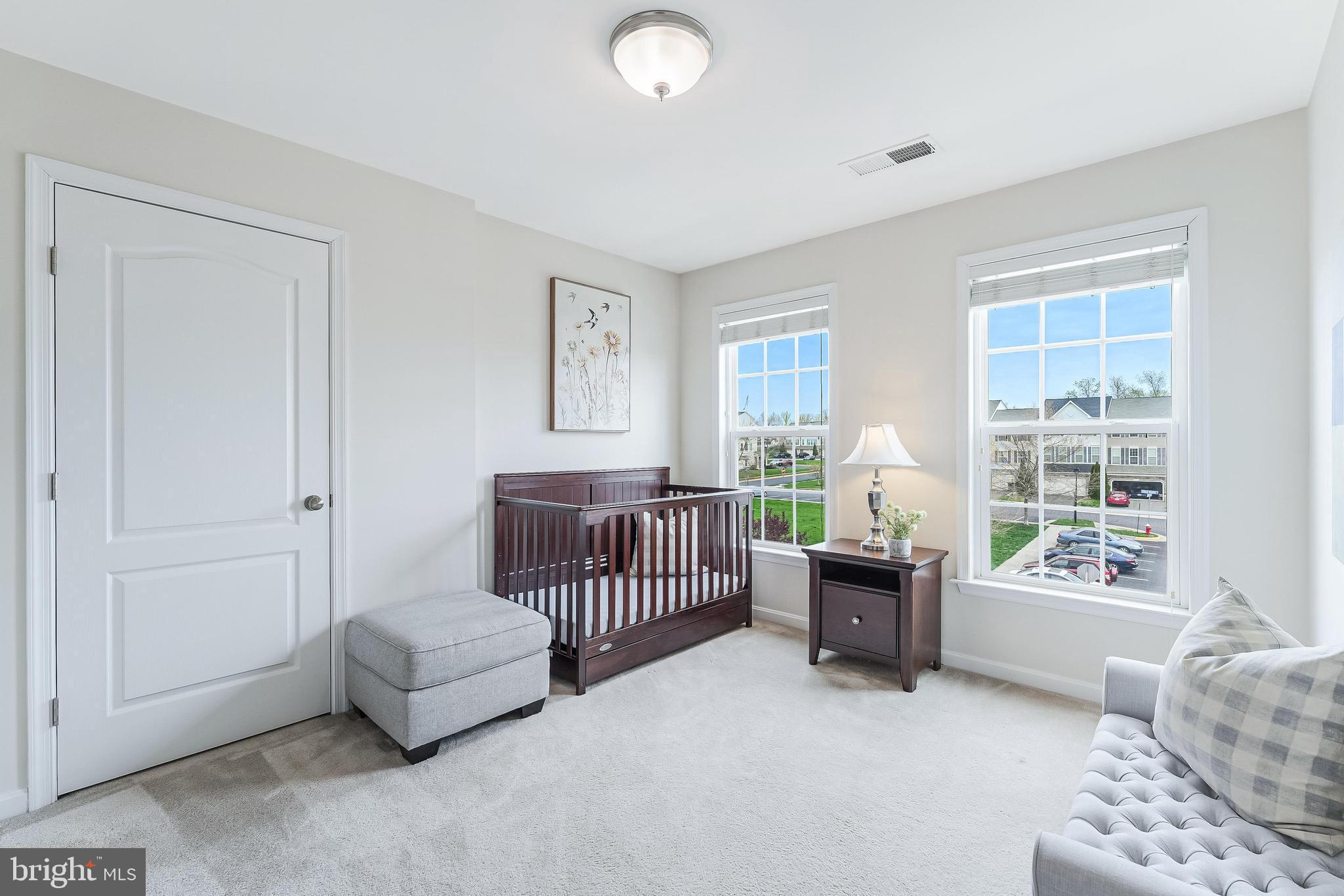 42467 Patrick Wayne Square Ashburn, VA 20148 - Photo 26 of 60 a bedroom with furniture and windows