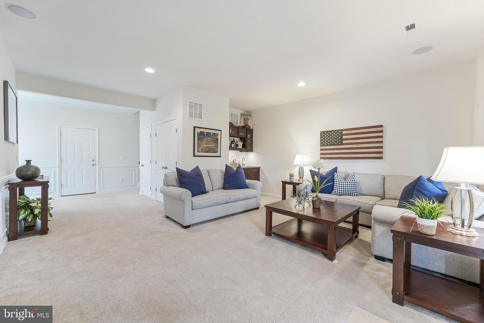 42467 Patrick Wayne Square Ashburn, VA 20148 - Photo 34 of 60 a living room with furniture and a couch