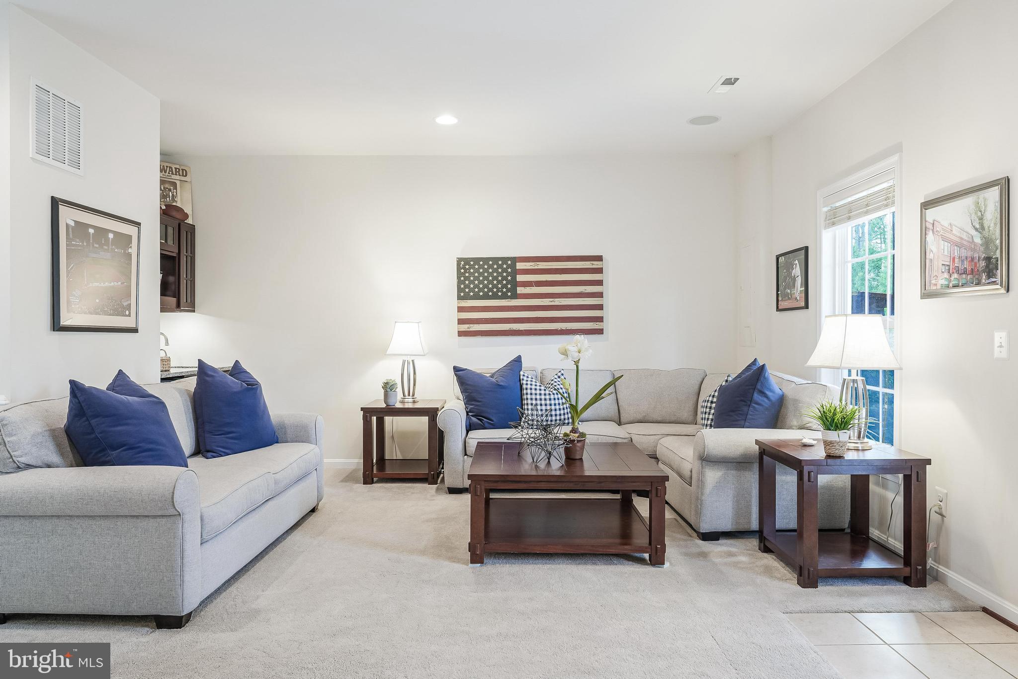 42467 Patrick Wayne Square Ashburn, VA 20148 - Photo 35 of 60 a living room with furniture and a window