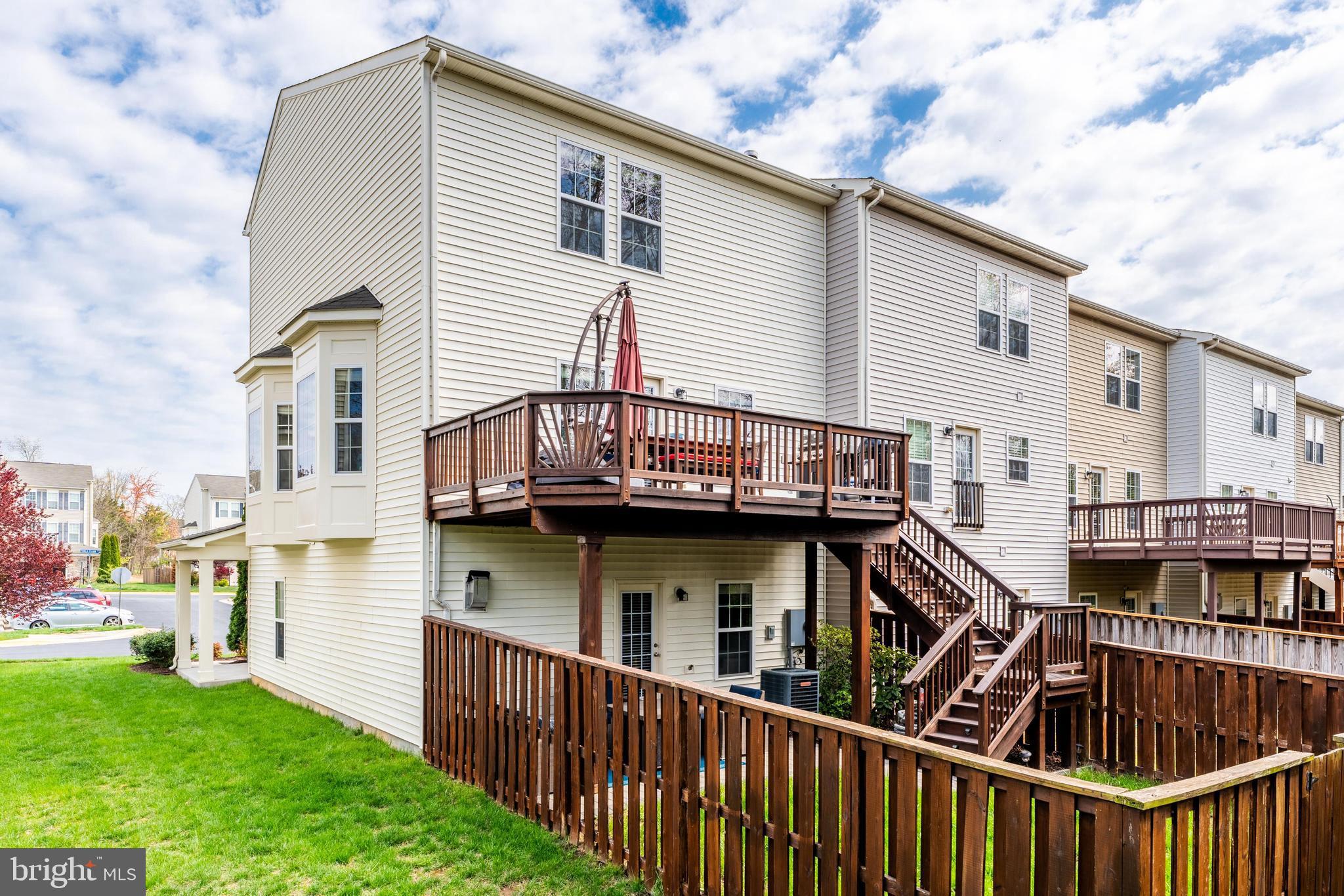 42467 Patrick Wayne Square Ashburn, VA 20148 - Photo 41 of 60 a view of a house with a balcony