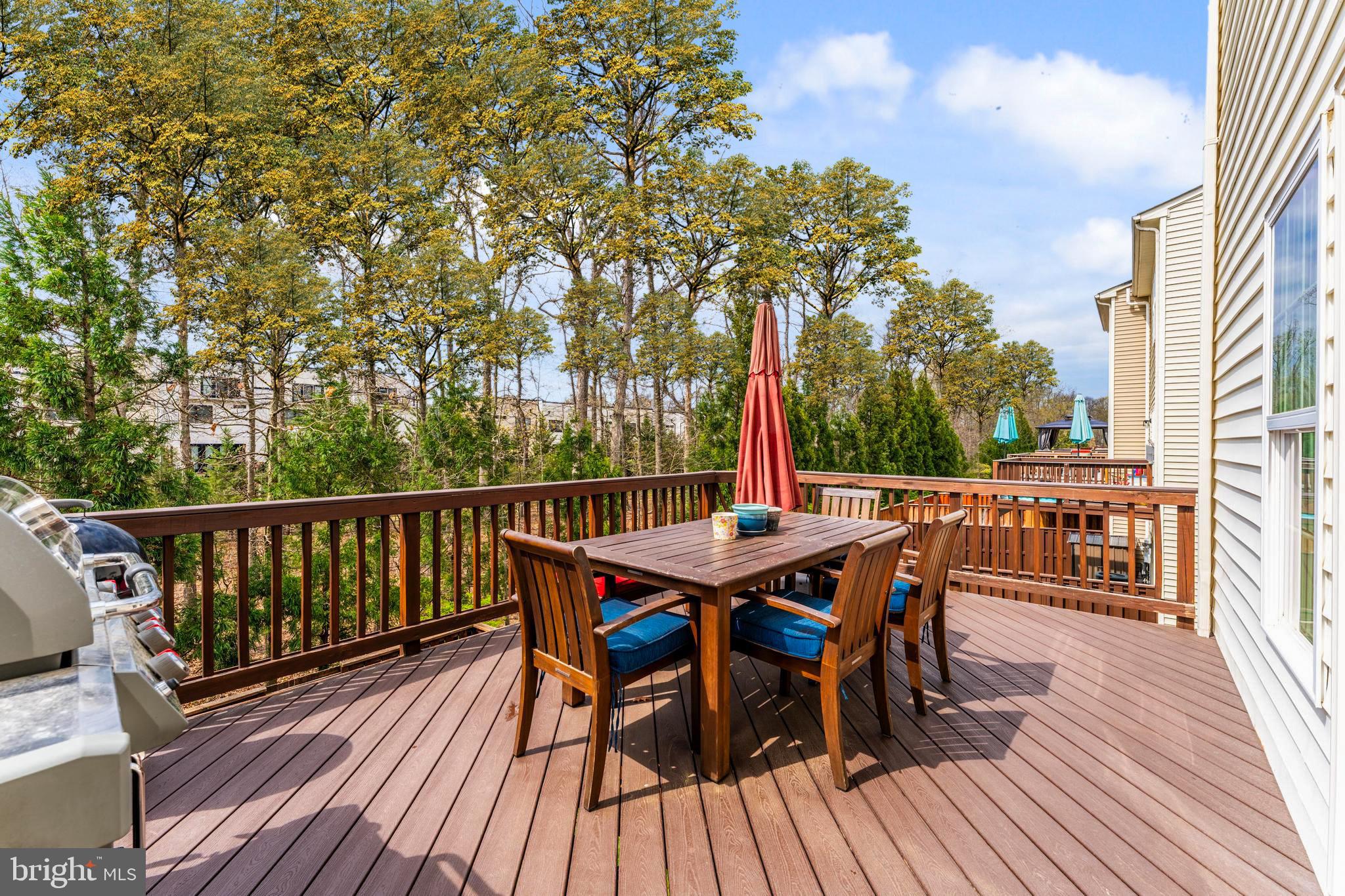 42467 Patrick Wayne Square Ashburn, VA 20148 - Photo 42 of 60 a view of a deck patio and outdoor seating
