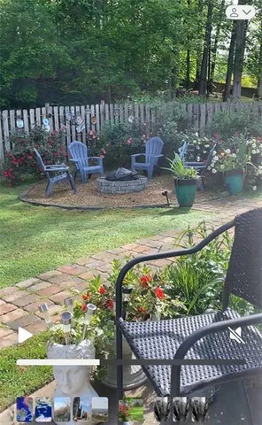 a house view with a garden space