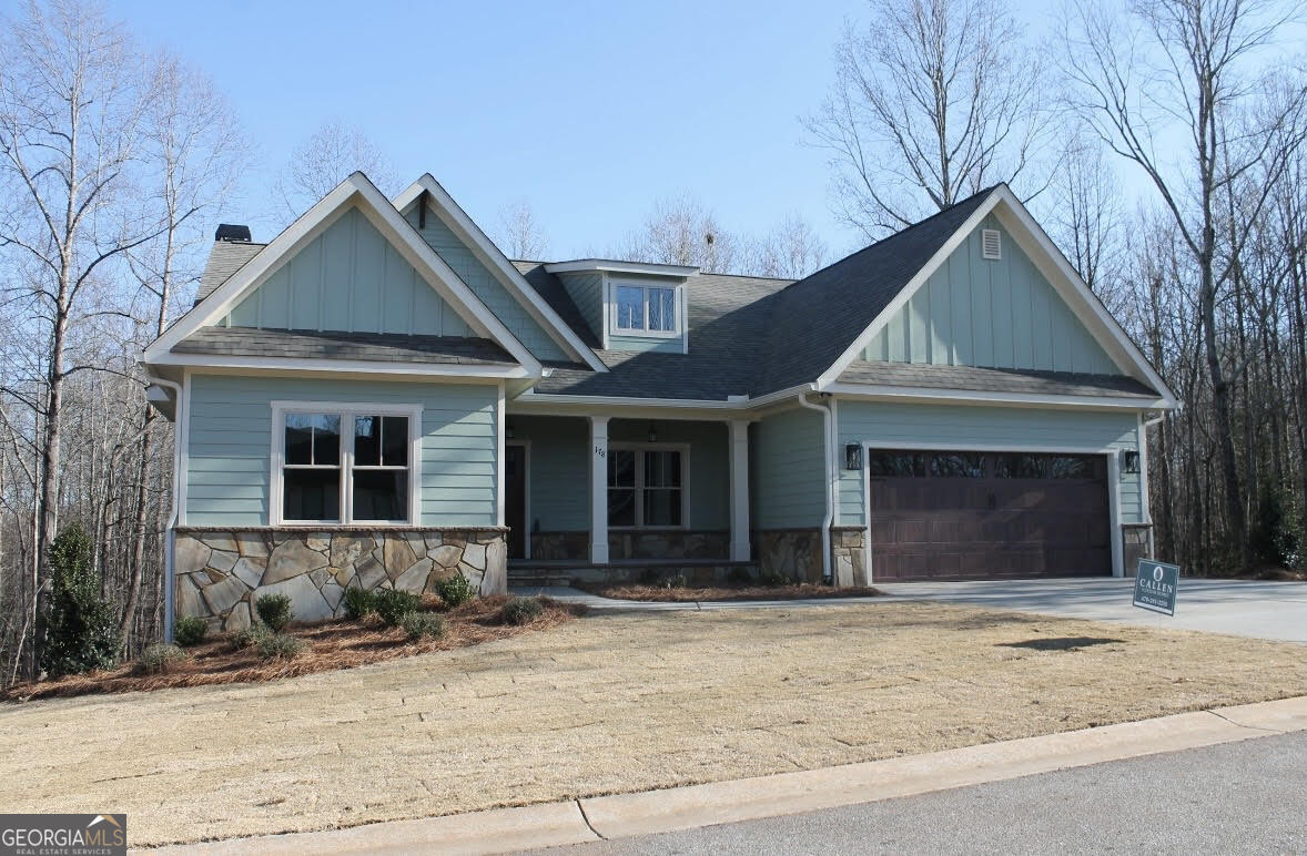 a front view of a house with yard