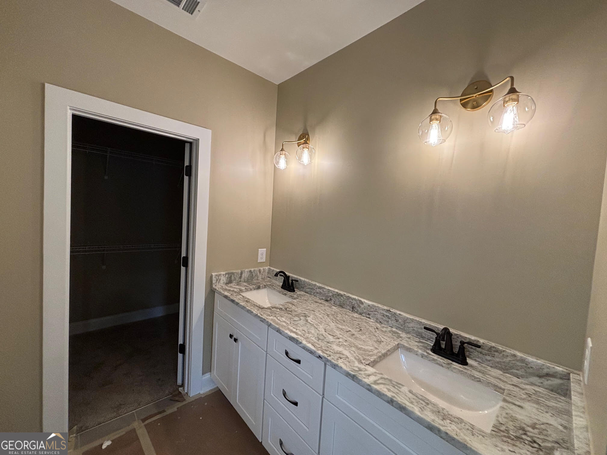 178 Samson Way Cleveland, GA 30528 - Photo 15 of 32 a bathroom with a granite countertop sink and a mirror