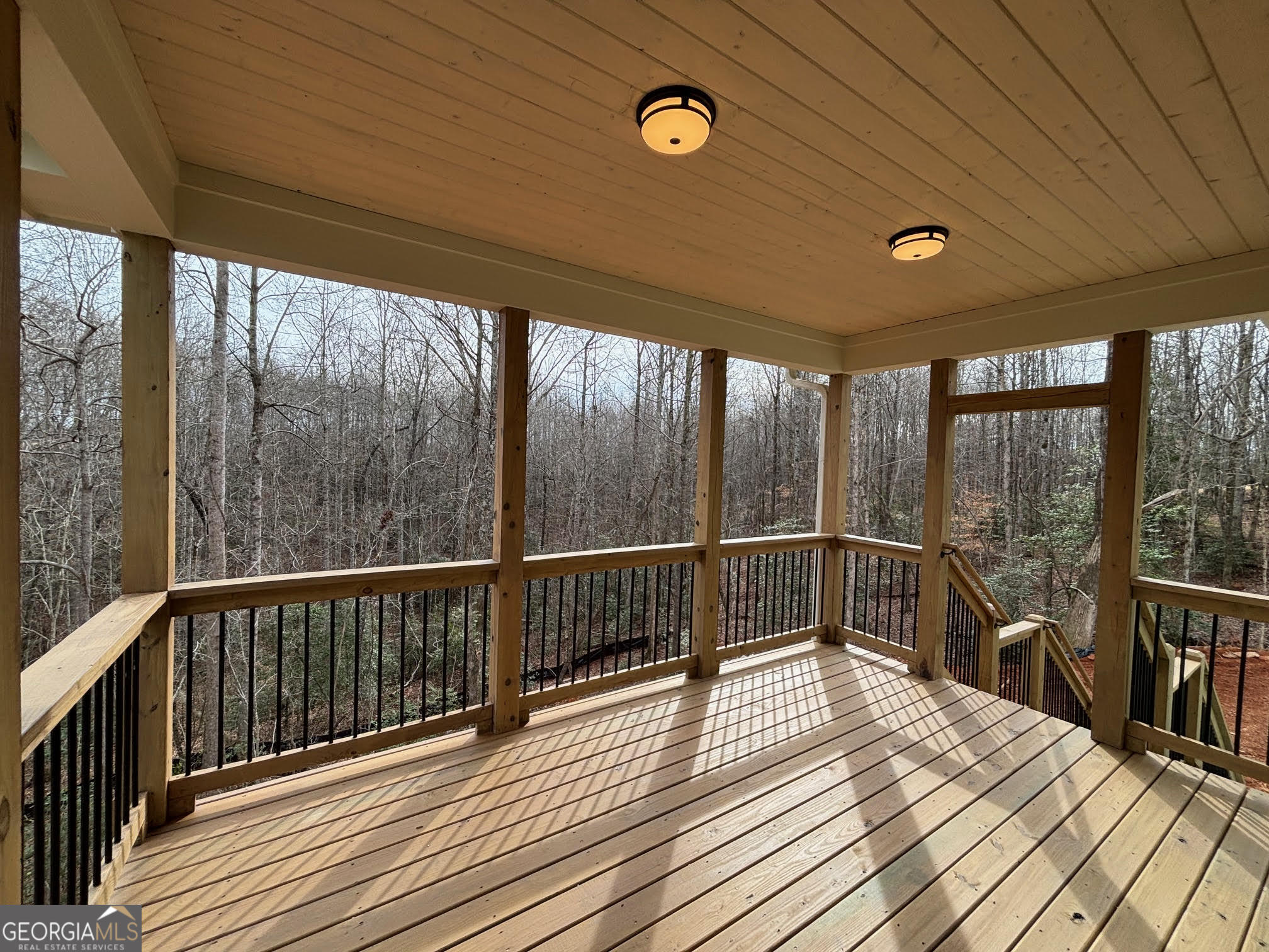 178 Samson Way Cleveland, GA 30528 - Photo 23 of 32 a view of a balcony with wooden floor