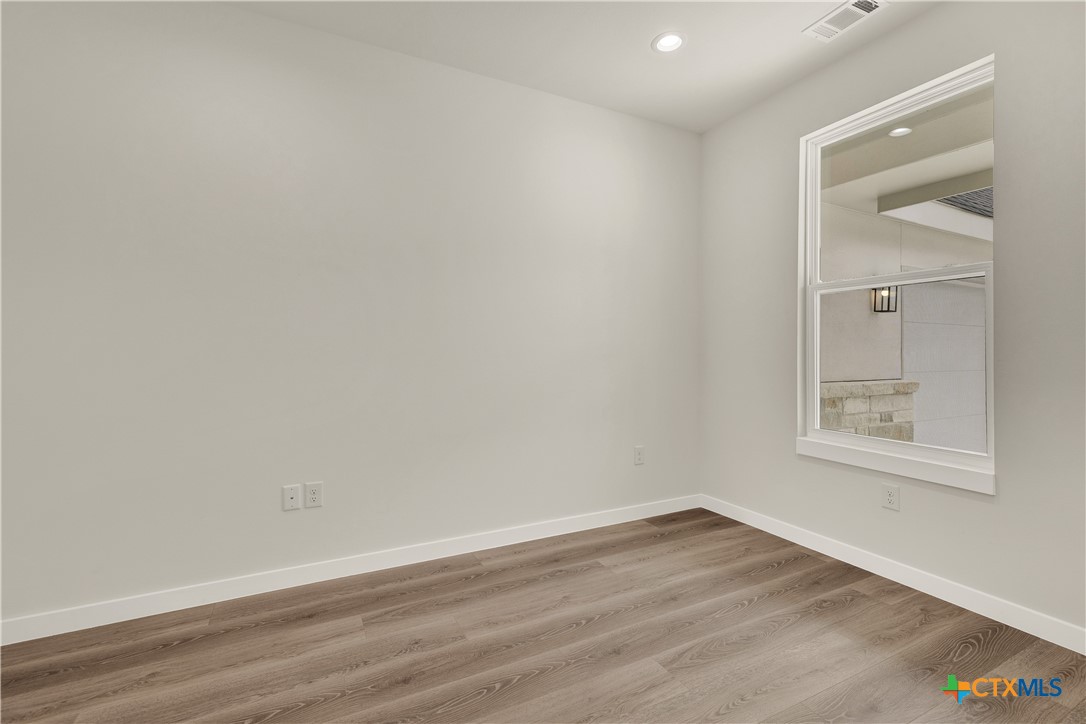 328 Compass Rose Spring Branch, TX 78070 - Photo 8 of 48 wooden floor in an empty room