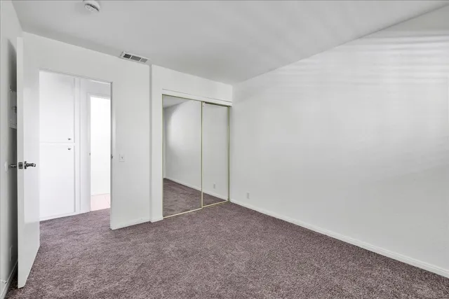 a bathroom with a sink vanity and a mirror