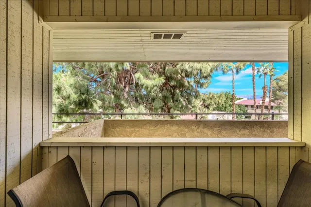 a bird view of a house with a swimming pool