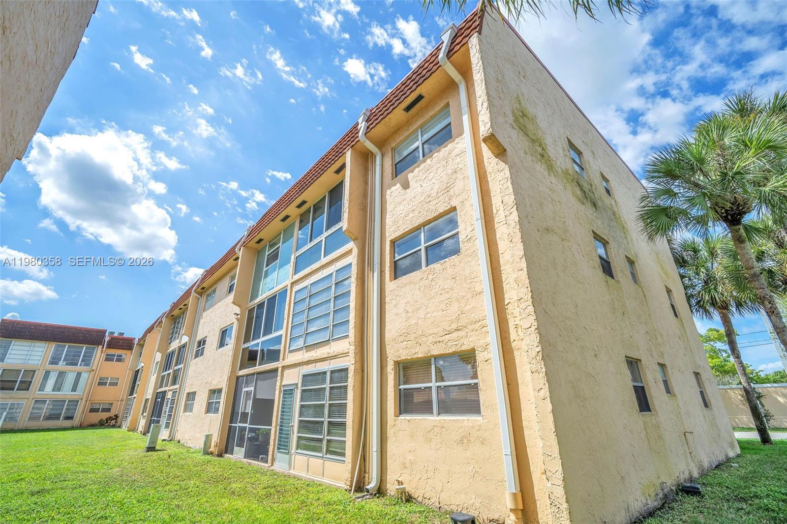2720 North Pine Island Road, Unit 306 Sunrise, FL 33322 - Photo 12 of 23 a view of an apartment building