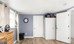 a view of a storage and utility room with a window