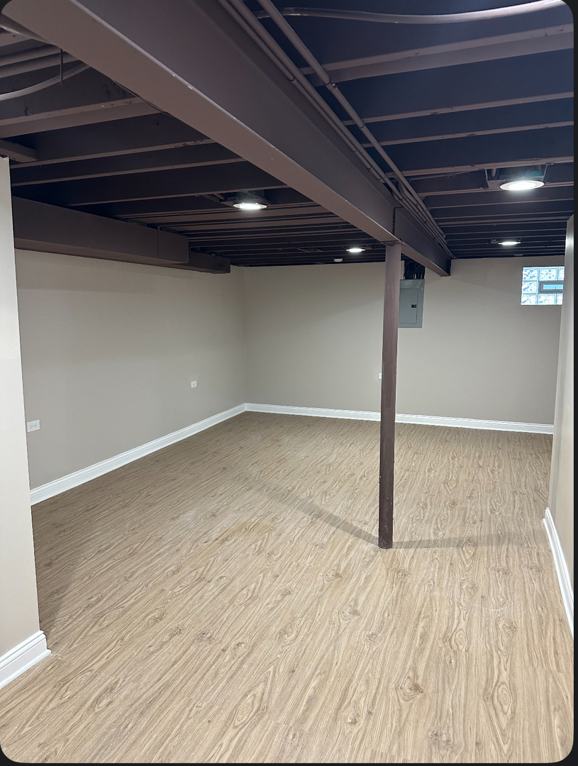 11754 South Laflin Street Chicago, IL 60643 - Photo 11 of 18 a view of a room with wooden floor